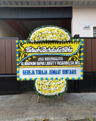 Papan Bunga Duka di Tebas